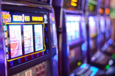 Mobile phone showing live roulette table interface with dealer and betting chips